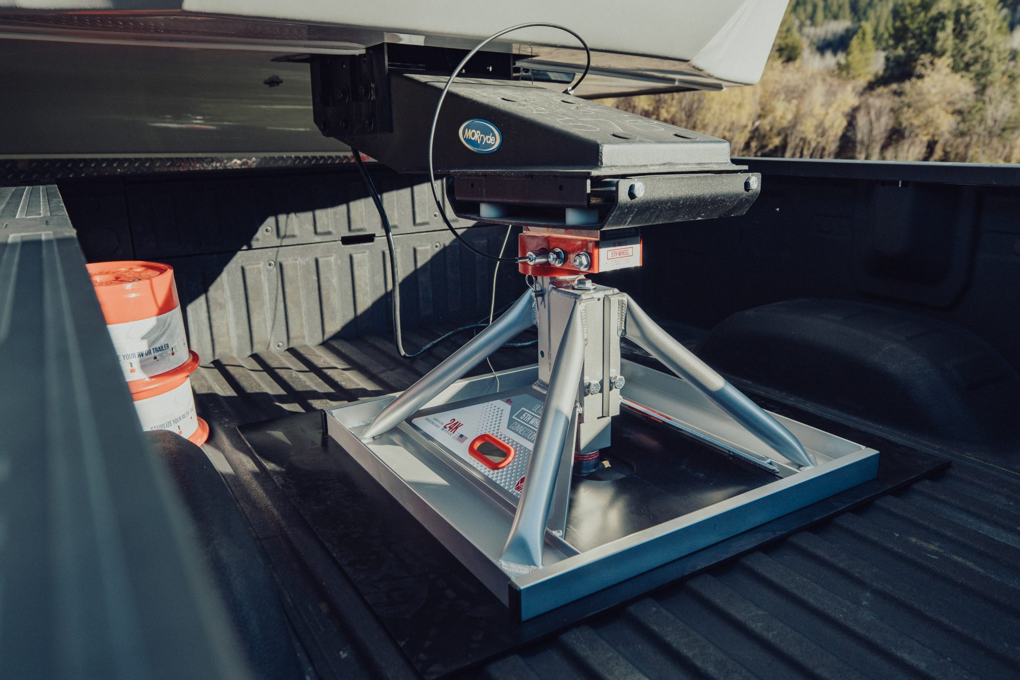 Pickup truck receiving a trailer hitch installation
